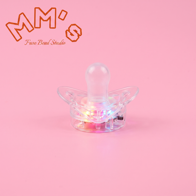 Light-up LED pacifier charm with switch